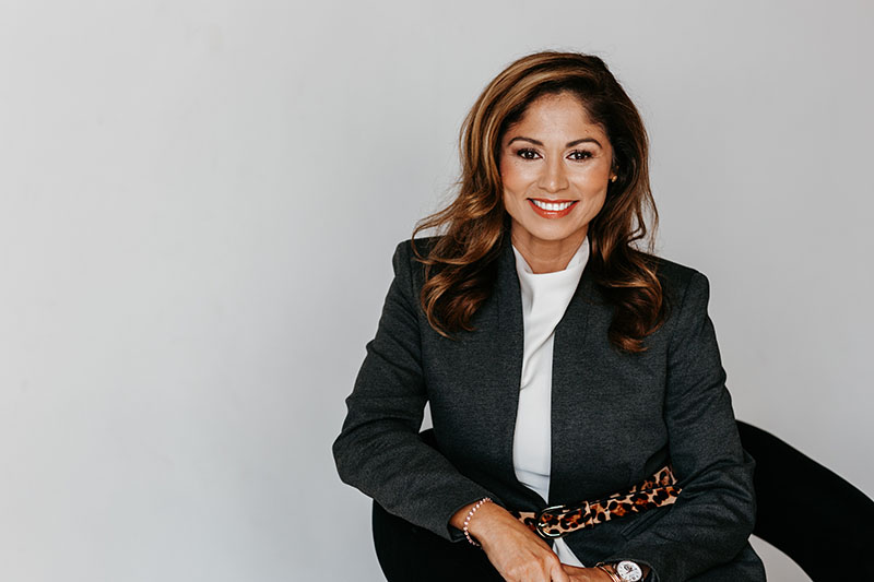 Insurance agent Claudia Valencia smiling