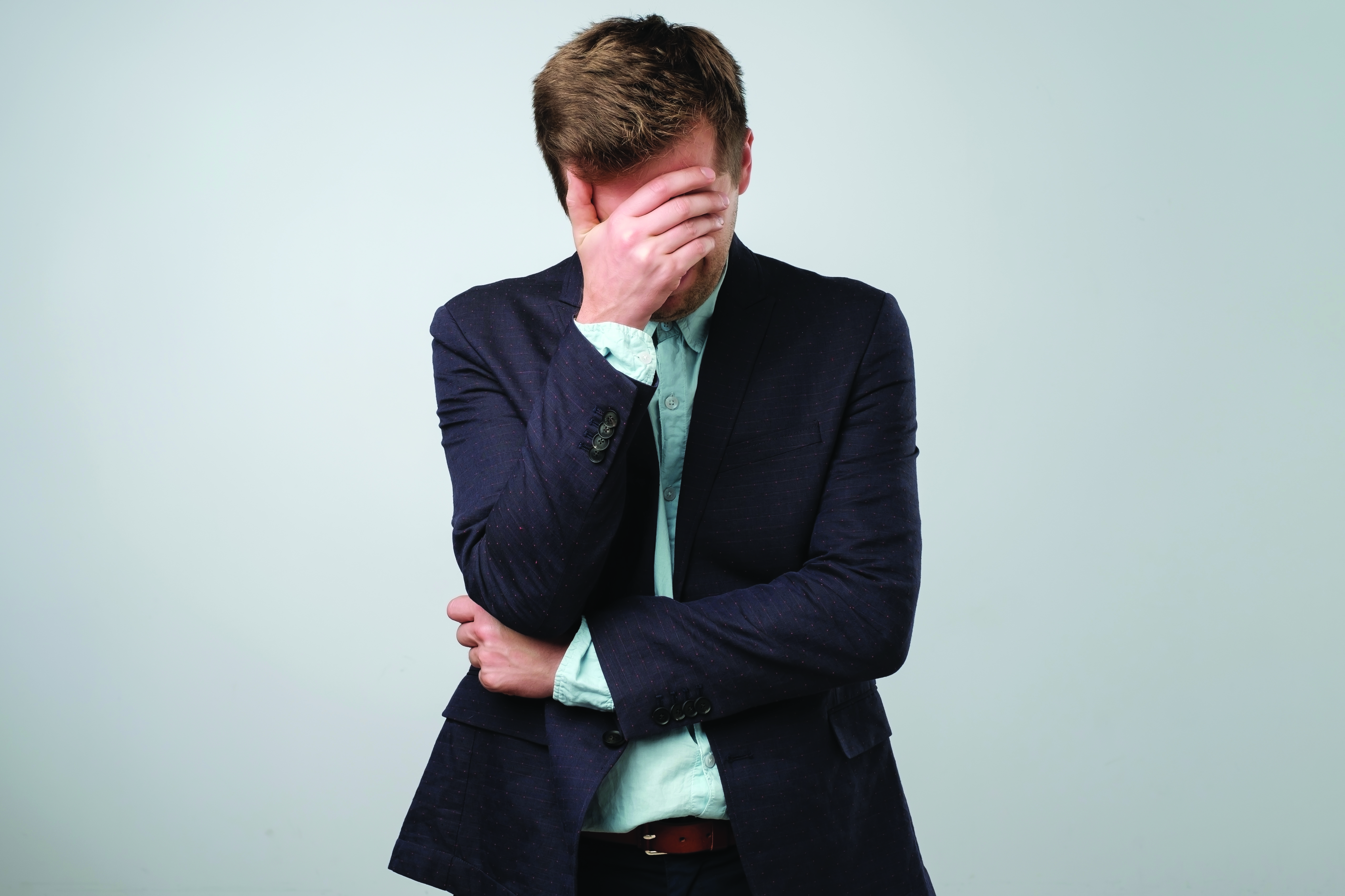 "Man with Face in Hand"